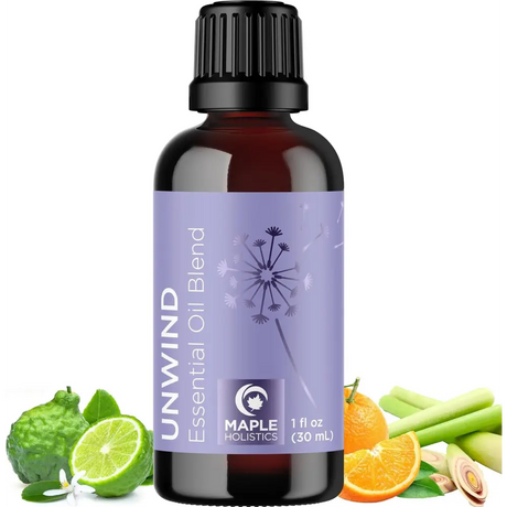 Dark amber essential oil bottle with purple dandelion label for Dream and Breathe blend