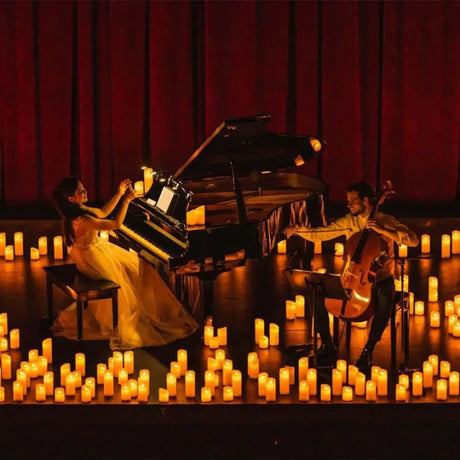 Musicians playing piano and cello with LED flameless candles creating a warm flame effect
