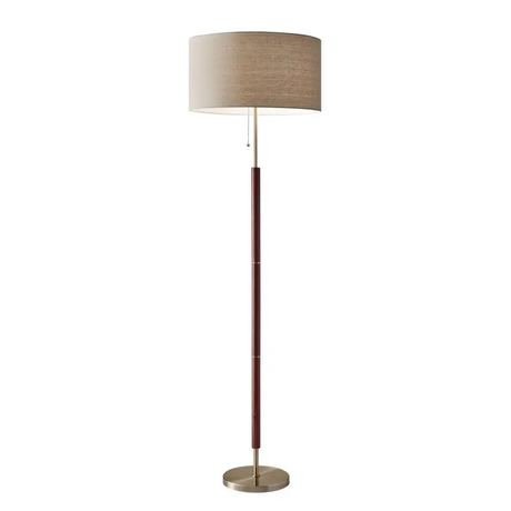 Modern floor lamp with wooden pole and beige shade next to Modern Grey Sectional Sofa