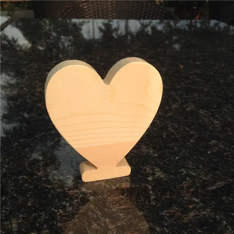 Wooden heart ornament on a stand, ideal for unfinished wood letters and perfect gift decor