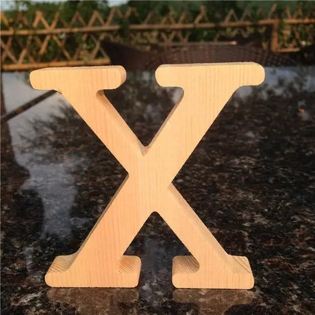 Wooden letter X in natural finish, perfect gift for home decor or photo frame display