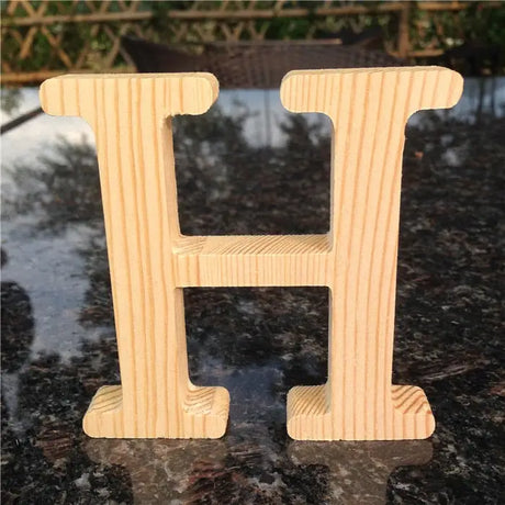 Wooden letter H with natural pine finish for home decor and perfect gift options