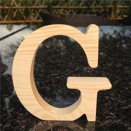Wooden letter G with grain pattern for photo frame or perfect gift in unfinished wood letters