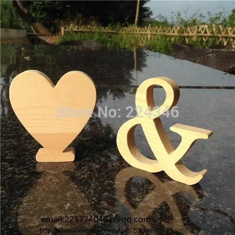 Wooden heart shape and ampersand symbol decorations for photo frames and gifts