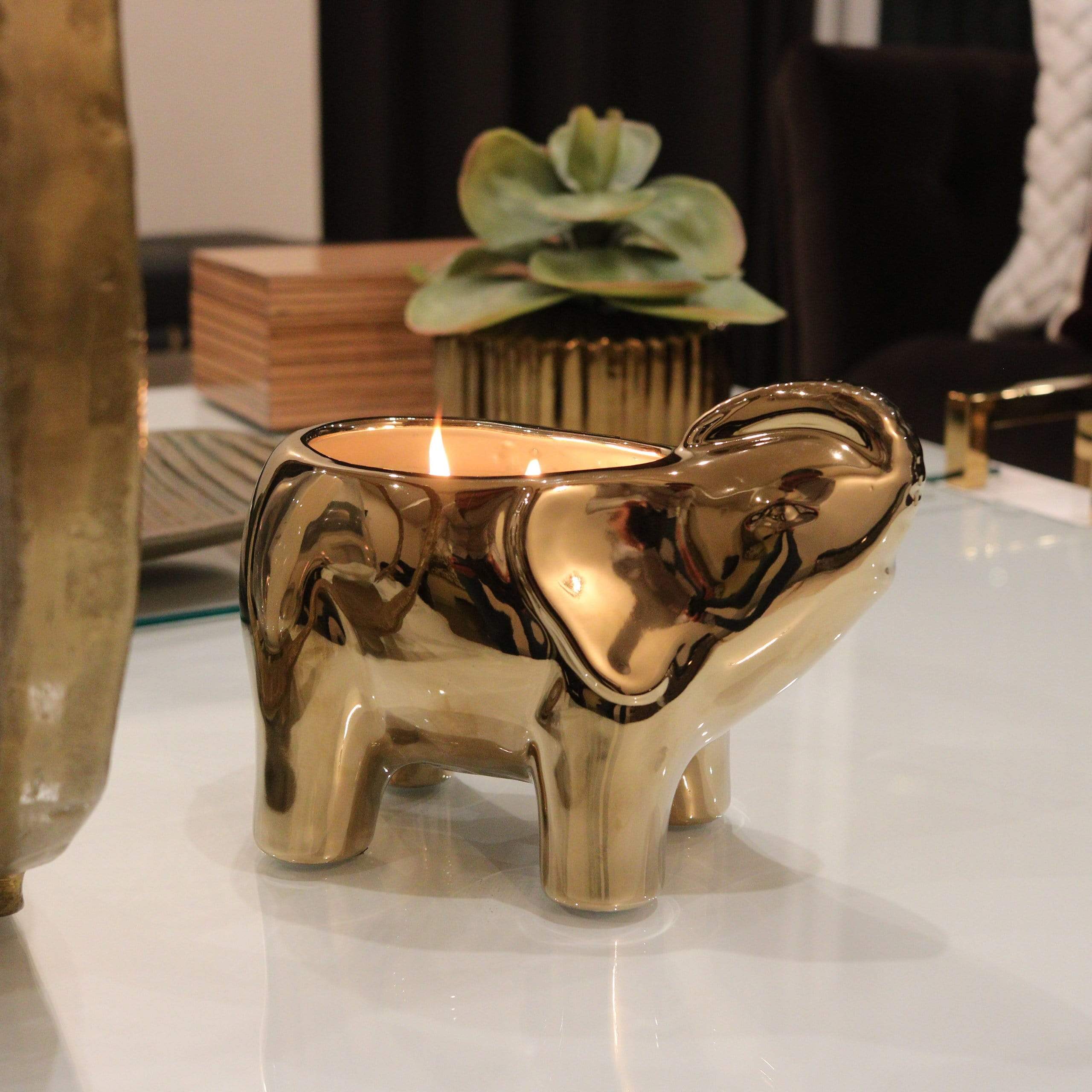 Scented Gold Elephant Candle  Gold living room decor, Gold living room,  Brown living room decor